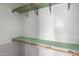 Closet with wooden hanging rods and shelves at 101 W Shannon St, Chandler, AZ 85225