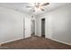Well-lit bedroom with ceiling fan and double closet at 101 W Shannon St, Chandler, AZ 85225