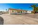 Newly renovated single-story home with a teal door and gravel landscaping at 101 W Shannon St, Chandler, AZ 85225