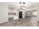 Modern kitchen with white cabinets, granite countertops and an island at 101 W Shannon St, Chandler, AZ 85225