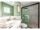 Updated bathroom with granite countertop and glass shower at 101 W Shannon St, Chandler, AZ 85225
