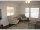 Spacious living room with ample natural light and comfortable seating at 9302 E Broadway Rd # 51, Mesa, AZ 85208