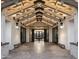 Inviting entryway with a high ceiling, large doors, and elegant tile flooring at 17640 W Guthrie St, Surprise, AZ 85388