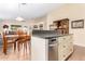 Kitchen island with dishwasher and light colored cabinets at 5752 W Novak Way, Laveen, AZ 85339