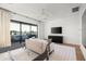 Main bedroom with a sitting area and access to a private balcony at 6154 E Alta Hacienda Dr, Scottsdale, AZ 85251