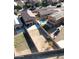 Aerial view of homes and community features at 19886 W Woodlands Ave, Buckeye, AZ 85326