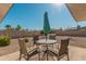 Relaxing patio with seating area and umbrella at 12739 W Beechwood Dr, Sun City West, AZ 85375