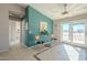 Charming breakfast nook with glass table and chairs, adjacent to the kitchen and patio doors at 30009 W Latham St, Buckeye, AZ 85396