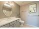 Bathroom with vanity, toilet and bathtub at 30009 W Latham St, Buckeye, AZ 85396