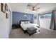 Bedroom with shiplap accent wall and comfortable seating at 1533 E Kramer St, Mesa, AZ 85203