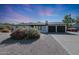 Single-story home with two-car garage and desert landscaping at 1533 E Kramer St, Mesa, AZ 85203