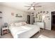 Main bedroom with a king-size bed and ceiling fan at 907 E 9Th Ave, Mesa, AZ 85204