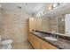 Elegant bathroom with double vanity and a large mirror at 7131 E Rancho Vista Dr # 3001, Scottsdale, AZ 85251