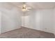 Bright bedroom with ceiling fan and carpet flooring at 542 S Higley Rd # 99, Mesa, AZ 85206