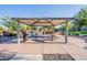Community picnic area with tables and playground in the background at 4307 E Jesse St, Gilbert, AZ 85295