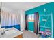 Bathroom with teal walls, a sink, and shower/tub combo at 10847 E Forge Cir, Mesa, AZ 85208