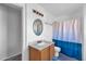 Clean bathroom with a single sink vanity and shower/tub at 10847 E Forge Cir, Mesa, AZ 85208