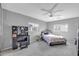 Bedroom with a bed, vanity, and plenty of natural light at 10847 E Forge Cir, Mesa, AZ 85208