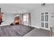 Dining room with wood floors and ample natural light at 10847 E Forge Cir, Mesa, AZ 85208