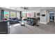 Open living room showcasing comfortable seating and access to kitchen at 10847 E Forge Cir, Mesa, AZ 85208