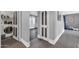 Convenient laundry room with washer, dryer, and additional storage at 10847 E Forge Cir, Mesa, AZ 85208