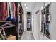 Large walk-in closet with ample hanging space and shelving at 10847 E Forge Cir, Mesa, AZ 85208