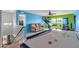 Fun game room with air hockey, couch, and basketball hoop at 10847 E Forge Cir, Mesa, AZ 85208