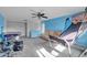 Game room featuring a basketball game, air hockey table, and drum set at 10847 E Forge Cir, Mesa, AZ 85208