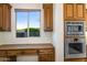 Kitchen with built-in microwave and oven at 8599 E Sand Flower Dr, Scottsdale, AZ 85266