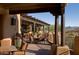 Relaxing outdoor patio with seating and mountain views at 27808 N Desierto Dr, Rio Verde, AZ 85263