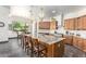 Island kitchen with granite countertops and ample cabinet space at 27808 N Desierto Dr, Rio Verde, AZ 85263
