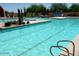 Community pool with lounge chairs and spa at 27808 N Desierto Dr, Rio Verde, AZ 85263