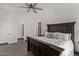 Serene bedroom with a king-size bed, neutral decor and an en-suite bathroom at 27808 N Desierto Dr, Rio Verde, AZ 85263