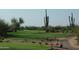 Scenic golf course view with desert landscape at 27808 N Desierto Dr, Rio Verde, AZ 85263