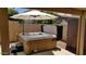 Hot tub with umbrella on patio at 6321 S Teresa Dr, Chandler, AZ 85249