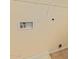 Laundry area with hookups and shelving at 6321 S Teresa Dr, Chandler, AZ 85249