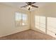 Bright bedroom with ceiling fan and window blinds at 6321 S Teresa Dr, Chandler, AZ 85249
