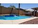 Inviting kidney-shaped pool with spa at 6321 S Teresa Dr, Chandler, AZ 85249
