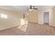 Spacious bedroom with ceiling fan and carpet at 6321 S Teresa Dr, Chandler, AZ 85249
