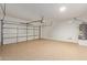 Garage with automatic door opener and water heater at 6321 S Teresa Dr, Chandler, AZ 85249