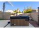 Hot tub with cover in backyard at 6321 S Teresa Dr, Chandler, AZ 85249