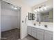 Bathroom with double vanity and walk-in closet at 6321 S Teresa Dr, Chandler, AZ 85249