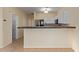 Modern kitchen with stainless steel appliances and tile countertops at 6321 S Teresa Dr, Chandler, AZ 85249