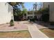 Complex exterior showing walkway, landscaping, and building at 3119 W Cochise Dr # 106, Phoenix, AZ 85051