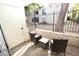 Private patio with wicker furniture and view of the complex at 3119 W Cochise Dr # 106, Phoenix, AZ 85051
