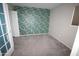 Charming bedroom with animal print wallpaper and carpet flooring at 3119 W Cochise Dr # 106, Phoenix, AZ 85051