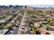 Aerial view of neighborhood, showing homes, streets, and mountain backdrop at 2324 E Shea Blvd, Phoenix, AZ 85028