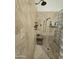 Walk-in shower with tiled walls and dual shower heads at 7801 E Davenport Dr, Scottsdale, AZ 85260