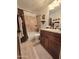 Well-appointed bathroom with tile flooring and a soaking tub at 7801 E Davenport Dr, Scottsdale, AZ 85260