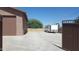 Property exterior showcasing a large garage and gated entry at 7801 E Davenport Dr, Scottsdale, AZ 85260